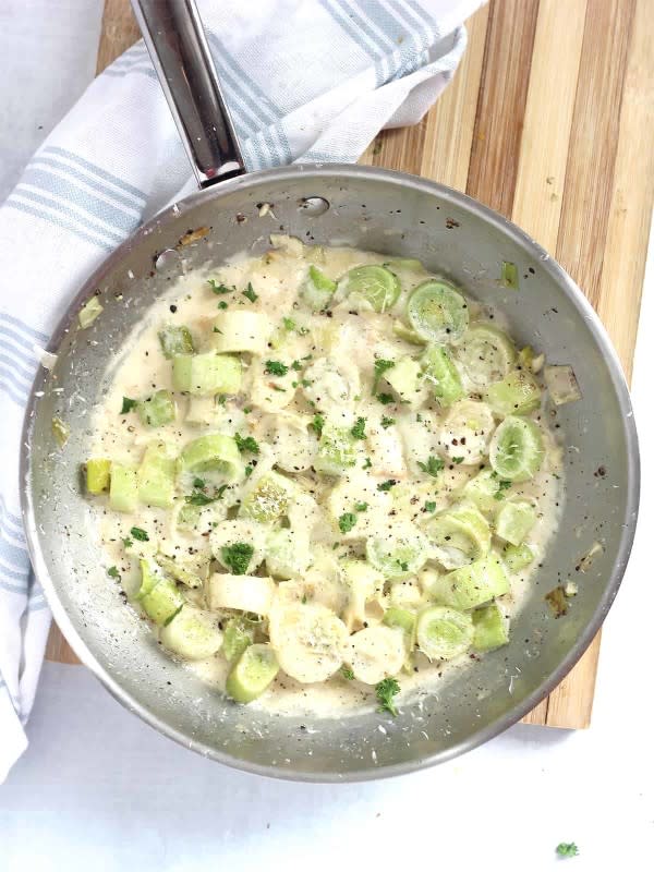 <p>Bite on the Side</p><p>Creamy and cheesy, these parmesan creamed leeks are a quick and easy veggies side. Cooked in one skillet on the stovetop and ready to serve in 15 minutes.</p><p><strong>Get the recipe: <a href="https://biteontheside.com/parmesan-creamed-leeks/" rel="nofollow noopener" target="_blank" data-ylk="slk:Parmesan Creamed Leeks;elm:context_link;itc:0;sec:content-canvas" class="link rapid-noclick-resp"><em>Parmesan Creamed Leeks</em></a></strong></p>