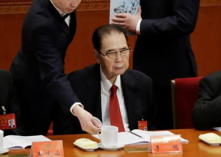 Former Chinese Premier Li Peng attends the opening session of the 19th National Congress of the Communist Party of China in Beijing