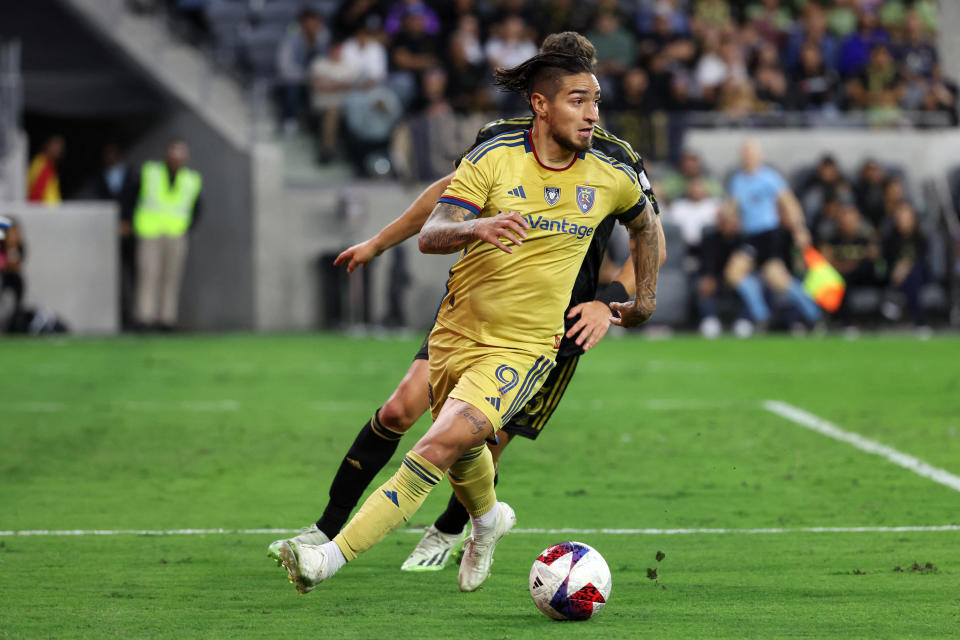 Real Salt Lake forward Cristian Arango (9) dribbles the ball during a game against Los Angeles FC at BMO Stadium. (Kiyoshi Mio-USA TODAY Sports)