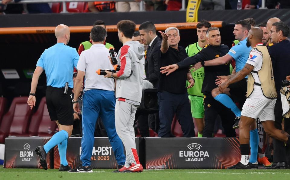 Mourinho was booked by Taylor towards the end of extra time - GETTY IMAGES