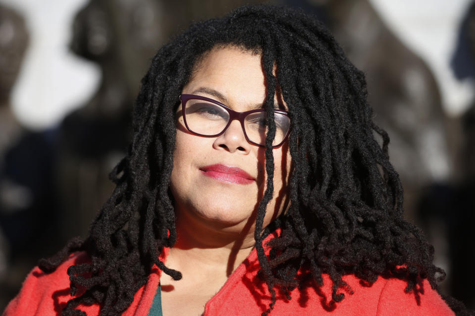 Wake Forest alumni Palinda Carrington poses in front of the Virginia Civil Rights Monument on Capitol Square in Richmond, Va., Sunday, Dec. 15, 2019. The school struggled with racial issues in the last school year and how it's addressed them will be a topic for the new school year. (AP Photo/Steve Helber)