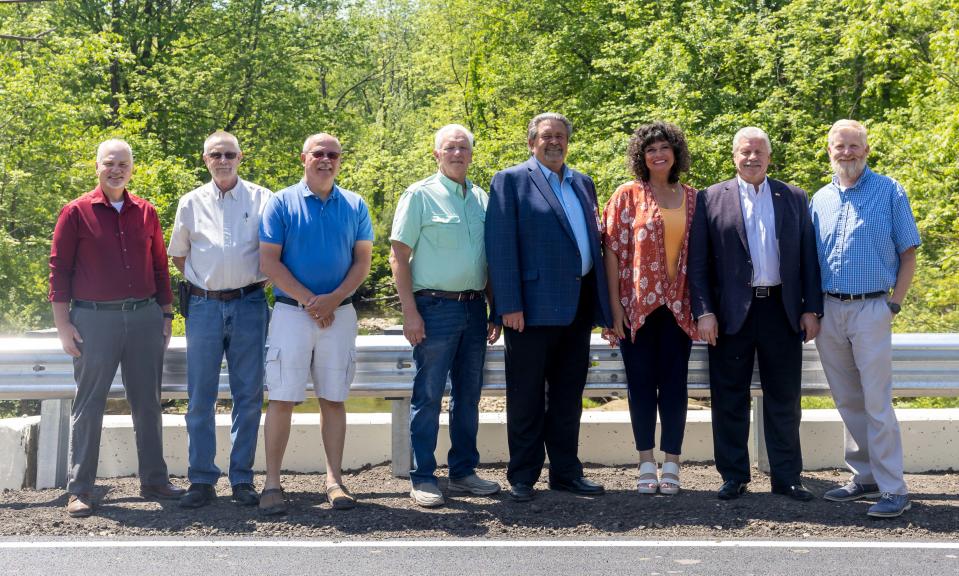 The new Newton Falls Road bridge in Ravenna Township recently reopened after having been closed for about 20 months. From left to right: William Vermes, bridge engineer; Ravenna Township trustees Jim DiPaola & Vince Coia; Charlestown Township Trustee Bruce Lange; county commissioners Mike Tinlin, Sabrina Christian-Bennett and Anthony J. Badalamenti; and Portage County Engineer Larry Jenkins.