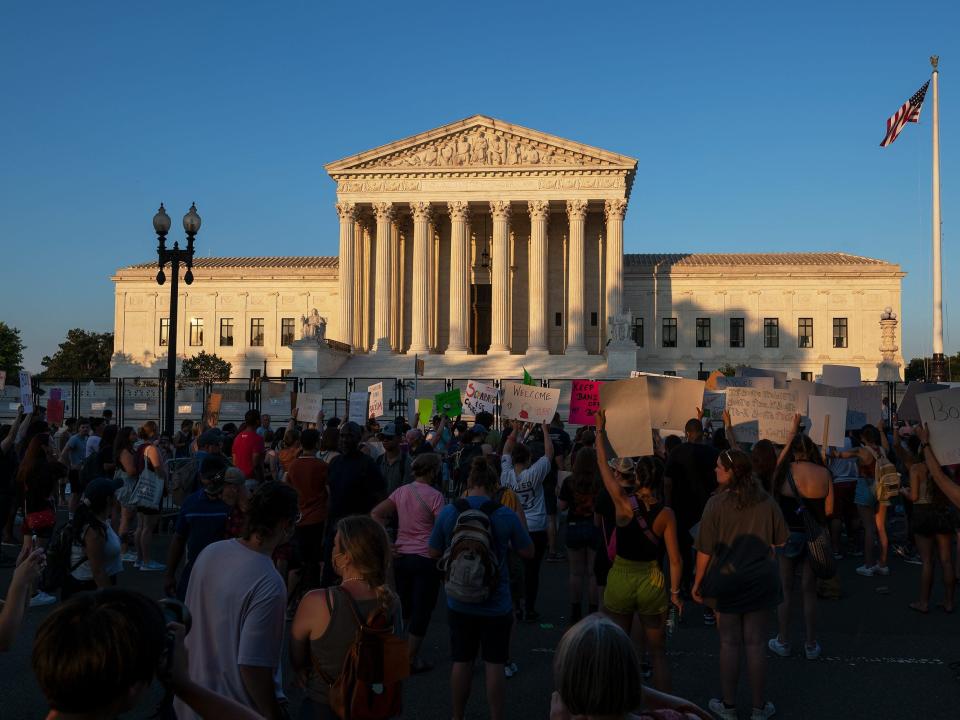 Abortion rights advocates demonstrate outside of the US Supreme Court a day after the Supreme Courts overturning of Roe v.  Wade in Washington, DC on June 25, 2022.