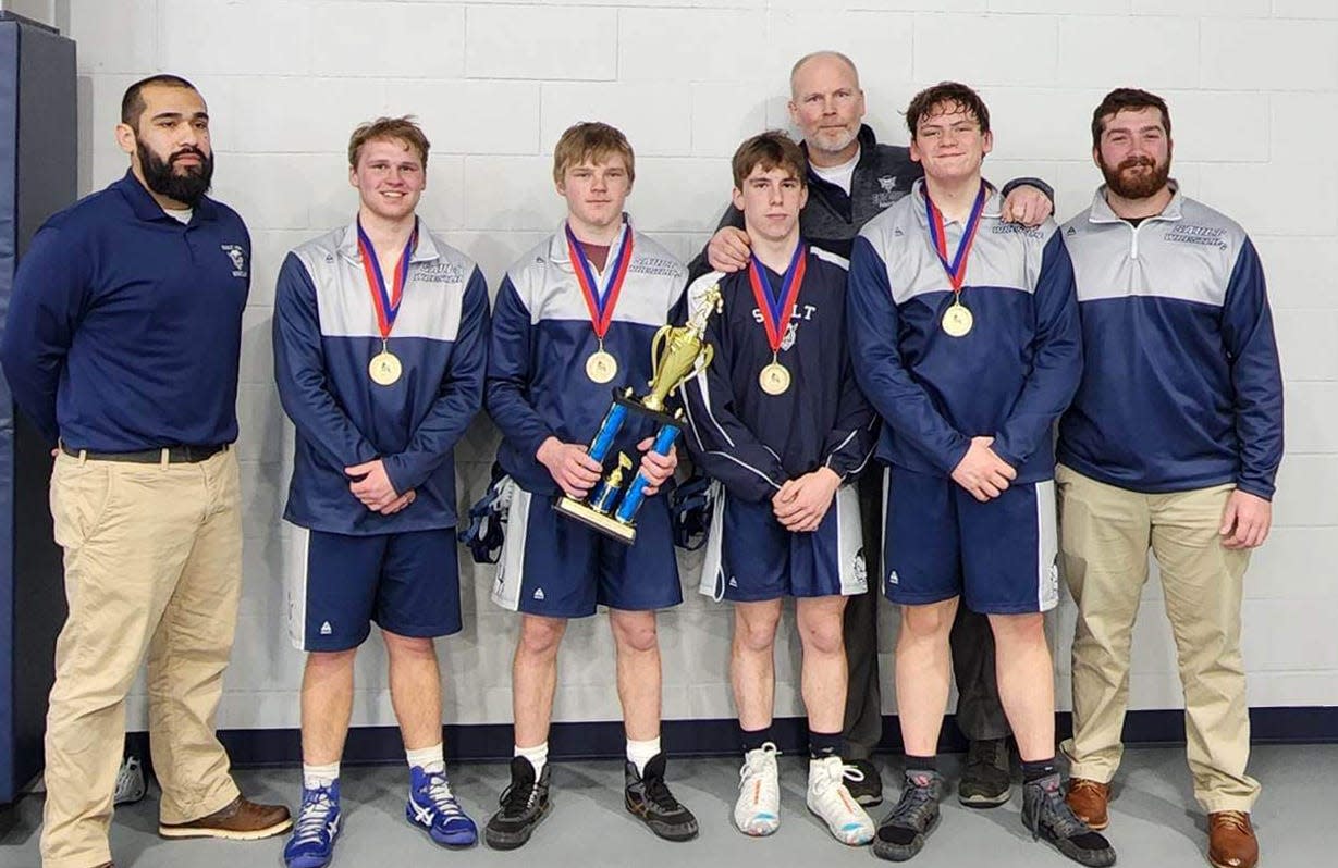 The Sault High wrestling team went 3-0 in the Boyne City Invitational on Thursday.  Four Blue Devil wrestlers went undefeated on the day..  From left to right, they were Tim Garland, Will Ohman, Brett Siesel, and Calvin Aldrich.  Also pictured is the Blue Devil coaching staff.  Also from left to right, Jacinto Arreola, Gordie Campbell, and Brendin Cryderman.