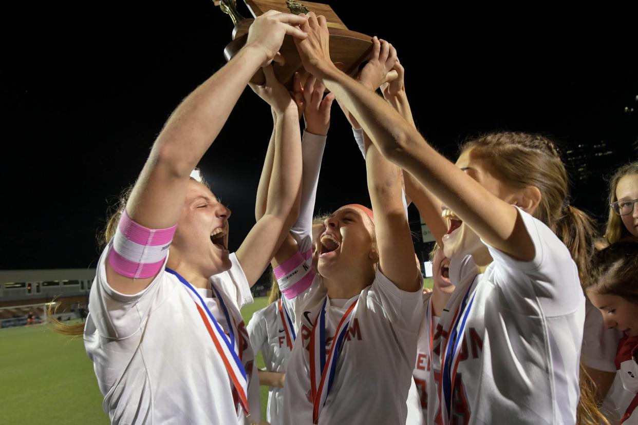 The Freedom Bulldogs celebrate after defeating Riverview in the Class 1A WPIAL soccer championship Friday night at Highmark Stadium in Pittsburgh.