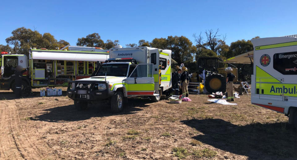 Queensland Ambulance Service paramedics, Queensland Fire and Emergency Service firefighters, and local medical professionals on the scene. Source: RACQ LifeFlight Rescue