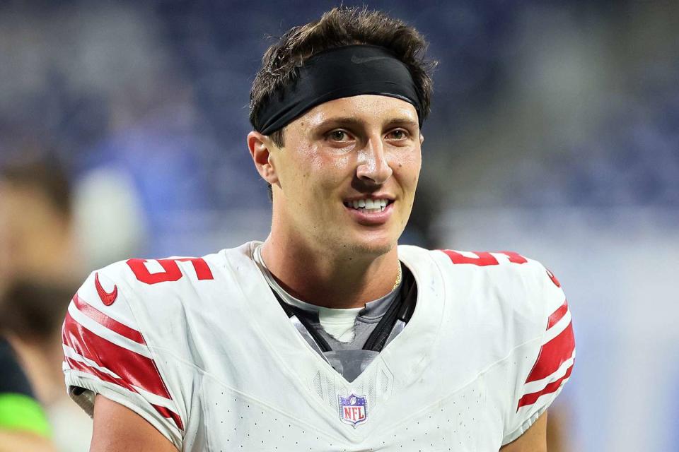 <p>Amy Lemus/NurPhoto via Getty</p> Quarterback Tommy DeVito of the New York Giants