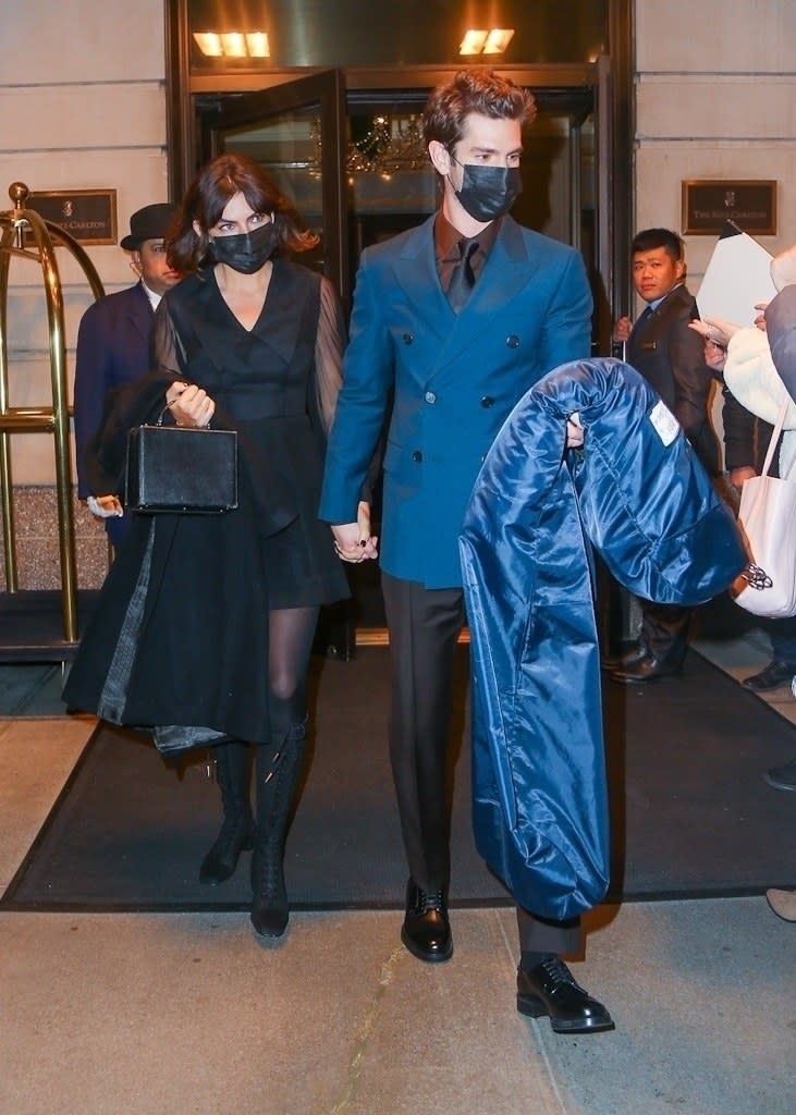 Andrew Garfield holds hands with his girlfriend as the couple makes the premiere of his new movie Tick, Tick…Boom!