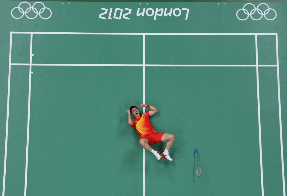 LONDON, ENGLAND - AUGUST 04: Haifeng Fu of China celebrates victory in his Men's Doubles Badminton Semi Final match against Boon Heong Tan and Kien Keat Koo of Malaysia on Day 8 of the London 2012 Olympic Games at Wembley Arena on August 4, 2012 in London, England. (Photo by Richard Heathcote/Getty Images)