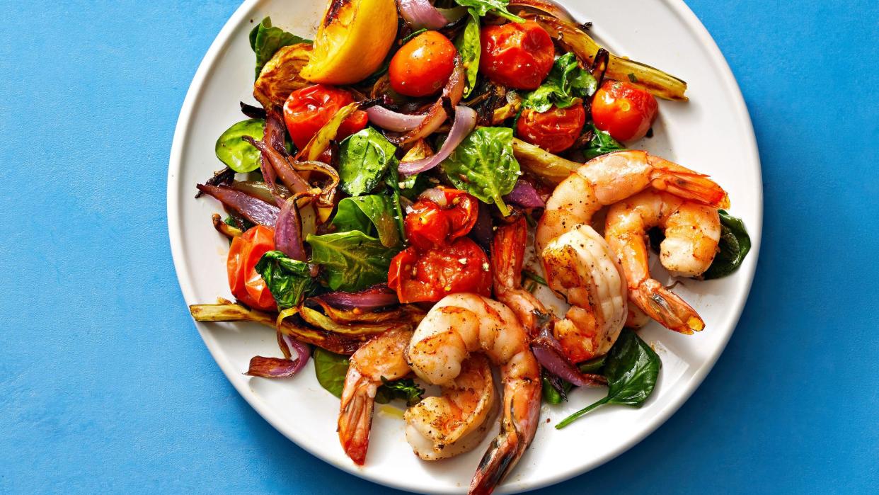 healthy roast shrimp and salad on a plate