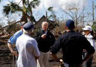 U.S. President Donald Trump and first lady Melania Trump tour areas ravaged by Hurricane Michael and talk with local officials and residents in Lynn Haven, Florida, U.S., October 15, 2018. REUTERS/Kevin Lamarque