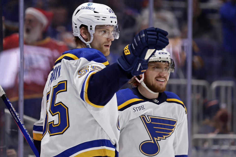 St. Louis Blues defenseman Colton Parayko (55) reacts after scoring a goal against the New York Islanders during the third period of an NHL hockey game Tuesday, Dec. 6, 2022, in Elmont, N.Y. The Blues won 7-4. (AP Photo/Adam Hunger)