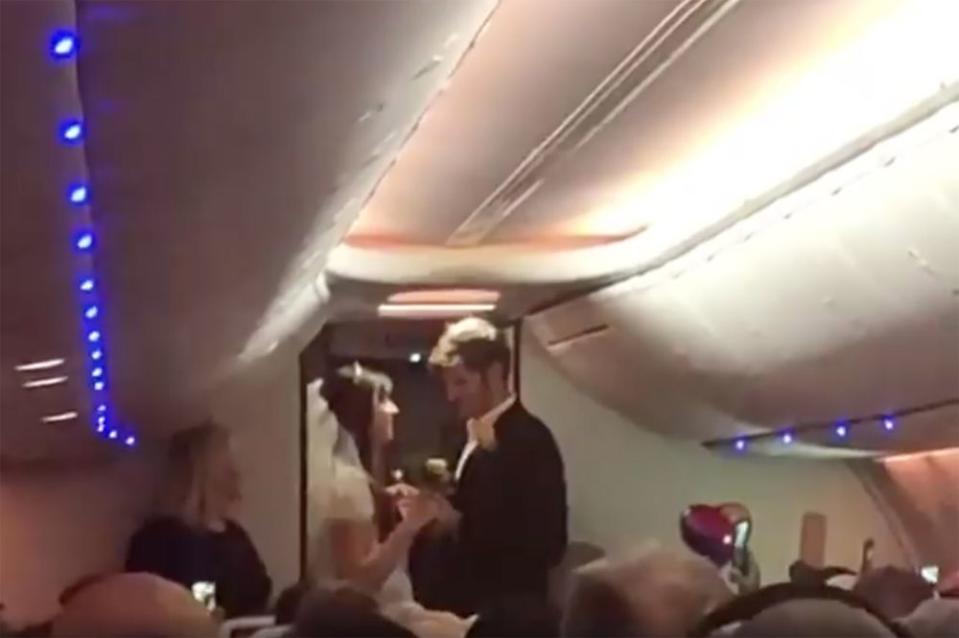 Michael and Renee were married in front of an entire plane of witnesses