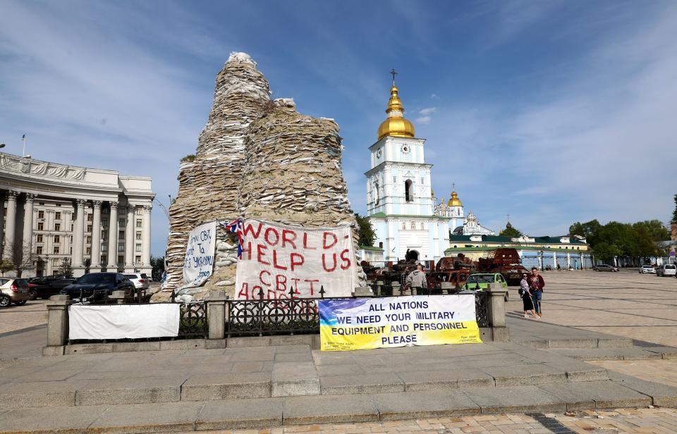 People come to look at an exhibition displaying destroyed Russian military vehicles in central Kyiv, Ukraine, on Wednesday, May 3, 2023. | Scott G Winterton, Deseret News