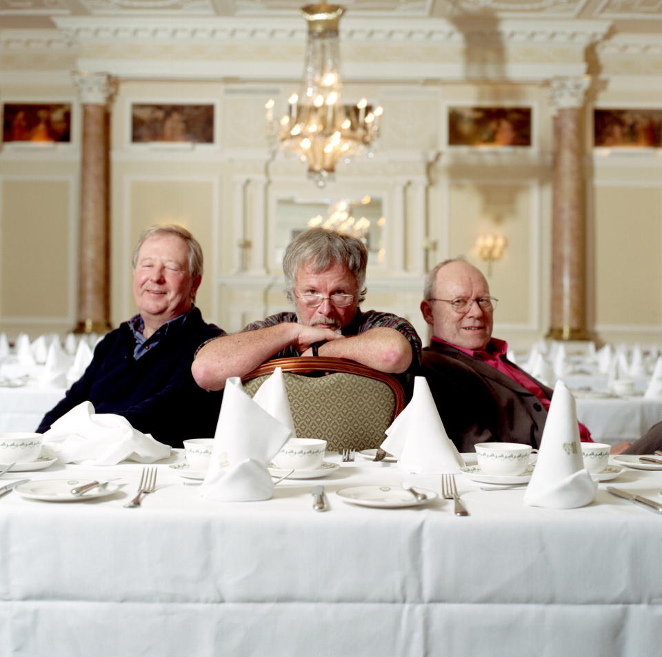 Portrait of The Goodies (Bill Oddie, Tim Brooke-Taylor and Graeme Garden) photographed at Simpsons in London in January 2005.; (Photo by Edd Westmacott/Photoshot/Getty Images)