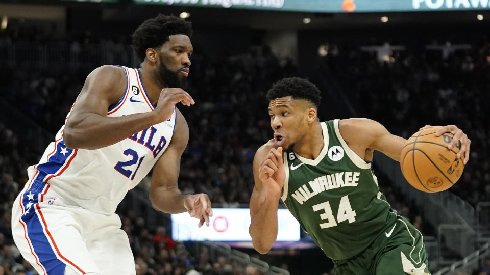 Milwaukee Bucks' Giannis Antetokounmpo drives to the basket against Philadelphia 76ers' Joel Embiid during the second half of an NBA basketball game Saturday, March 4, 2023, in Milwaukee. (AP Photo/Aaron Gash)
