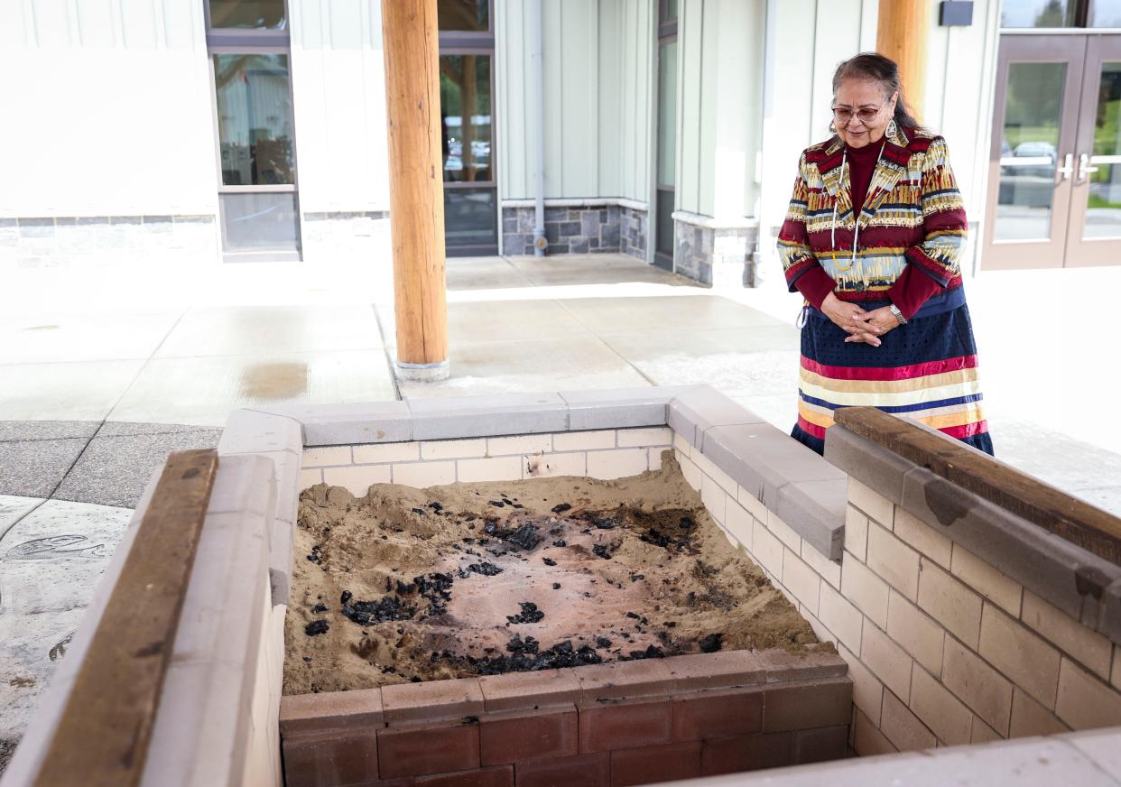 Tribal chairwoman Cheryle Kennedy looks at the fish pit at the new public health building in Grand Ronde.