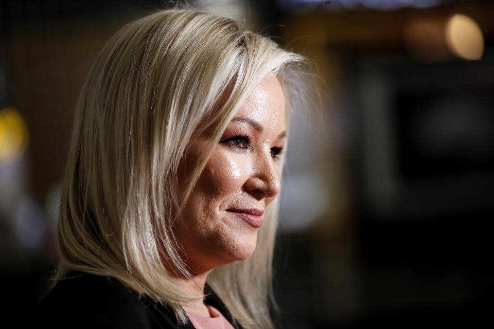 Michelle O'Neill, Sinn Fein leader in Northern Ireland, speaks to the media while out canvassing in West Belfast, Northern Ireland, Tuesday, May 3, 2022. The Sinn Fein election team were out election campaigning ahead of Thursdays local election. Sinn Fein, a force in Irish republicanism on both sides of the Irish border looks likely to become the largest party in the assembly, according to polls ahead of the May 5, 2022 local elections. (AP Photo/Peter Morrison)