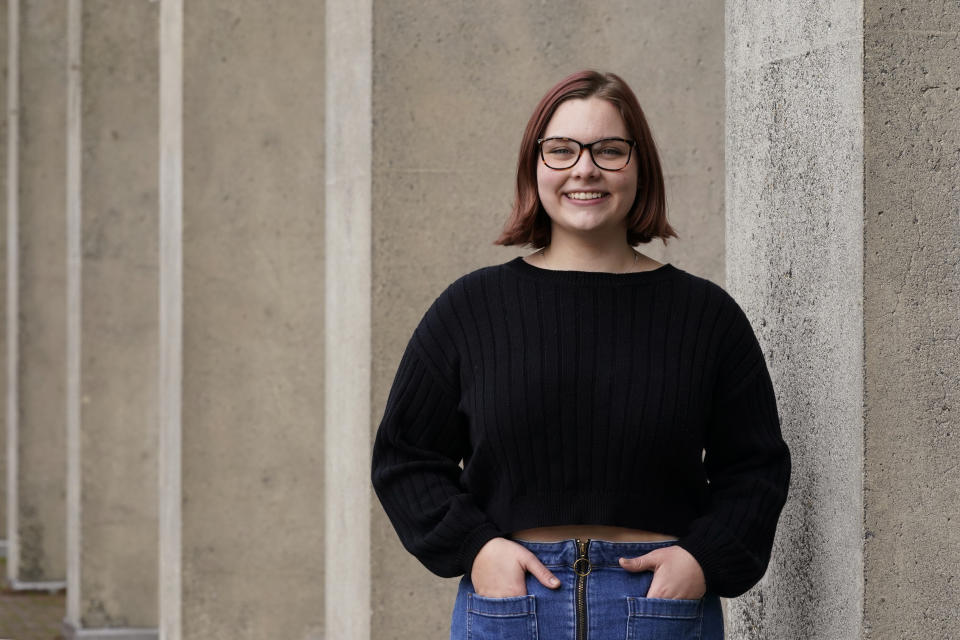 Sophie Corroon, a sophomore at the University of Washington, poses for a photo on the school's campus Monday, Jan. 25, 2021, in Seattle. Corroon helped work on proposed legislation in her home state of Utah to allow students to take mental health days to lessen stigma and help reduce youth suicide. Lawmakers in Utah and Arizona have proposed bills that would add "mental or behavioral" health to the list of excused absences for students. Similar legislation has passed in Oregon, Maine, Colorado and Virginia in the last two years. (AP Photo/Elaine Thompson)