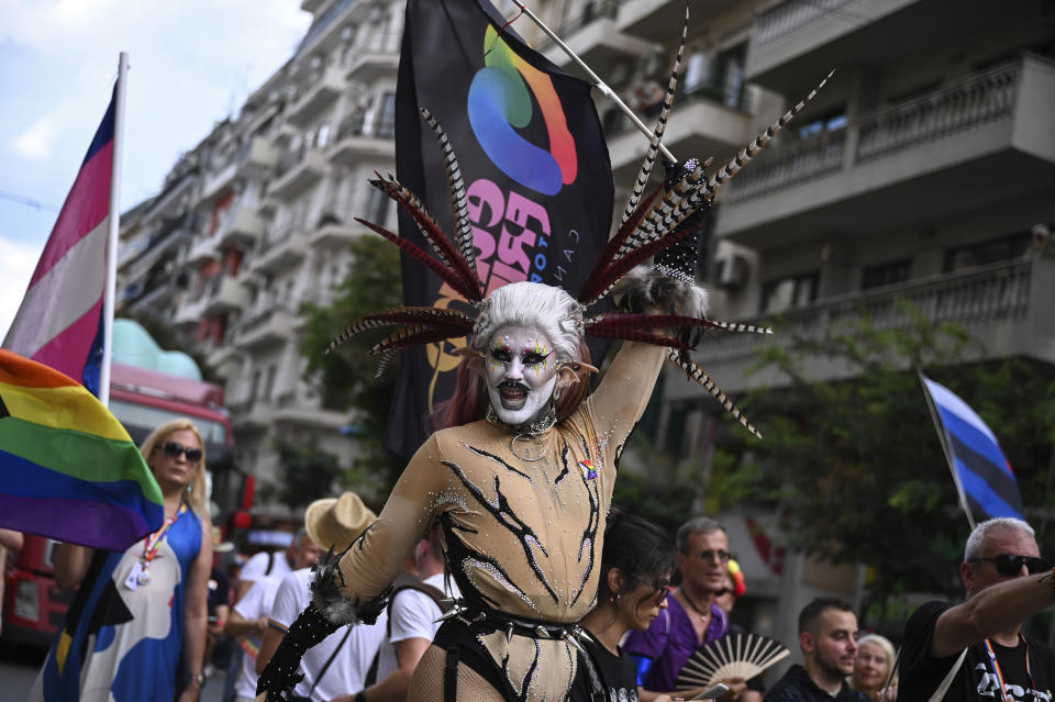 A reveller takes part in EuroPride, a pan-European international LGBTI event featuring a Pride parade which is hosted in a different European city each year, in the northern port city of Thessaloniki, Greece, Saturday, June 29, 2024. (AP Photo/Giannis Papanikos)