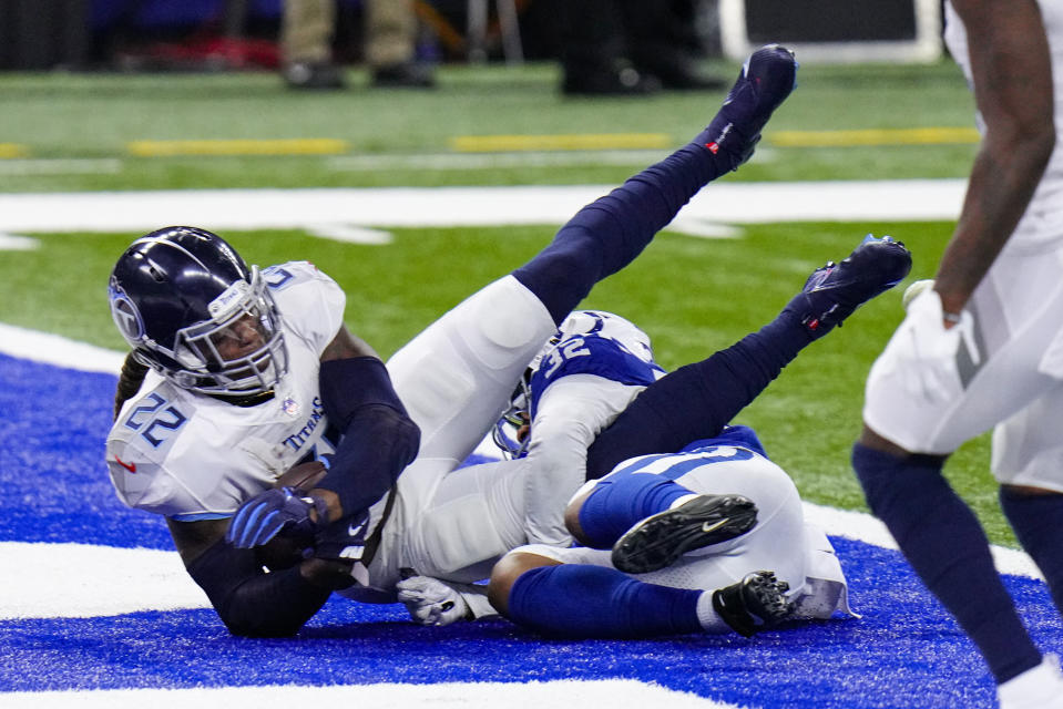 Tennessee Titans running back Derrick Henry (22) gets past Indianapolis Colts free safety Julian Blackmon (32) for a touchdown in the first half of an NFL football game in Indianapolis, Sunday, Nov. 29, 2020. (AP Photo/AJ Mast)