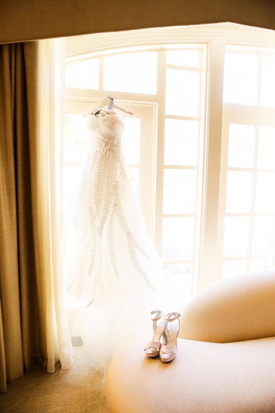 The bride wore Oscar de la Renta, inspired by her grandmother, for her greenery-filled ceremony at the Beverly Hills Hotel.