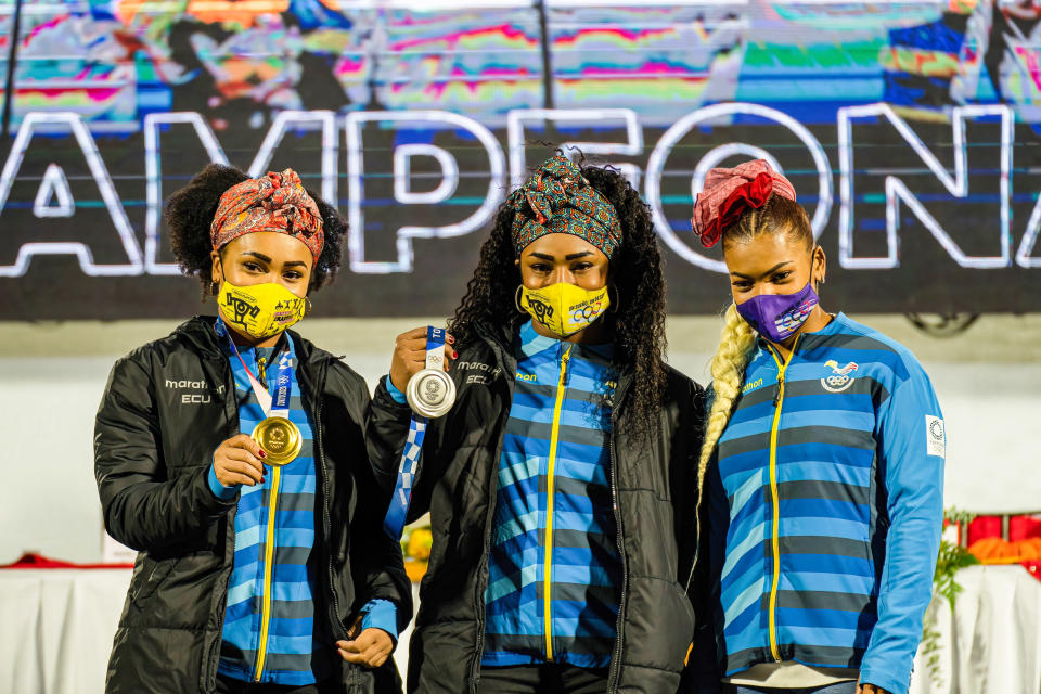 QUITO, ECUADOR - 2021/08/04: Neisi Dajomes, Tamara Salazar and Angie Palacios pose for a group photo at the Atahualpa Olympic Stadium in Quito.
Ecuadorians celebrate the return of three athletes following two medals and one olympic diploma in the 2020 Tokyo Olympics. (Photo by Vincent Ricci/SOPA Images/LightRocket via Getty Images)