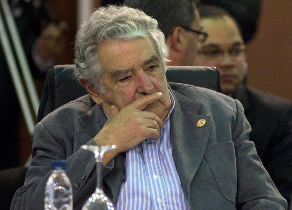 FILE - In this Dec. 3, 2011 file photo, Uruguay's President Jose Mujica attends a working session of the Community of Latin American and Caribbean States, CELAC, summit in Caracas, Venezuela. Uruguay's president has canceled his trip Thursday, Nov. 15, 2012, to the Ibero-American Summit in Spain, saying doctors have ordered bed rest after a painful blood clot was found in his lower right leg. The 77-year-old Jose Mujica says the clot was found with a sonogram and that he's following doctors' orders to relax at home for two or three days while taking anti-coagulant medicine. (AP Photo/Ariana Cubillos, File)