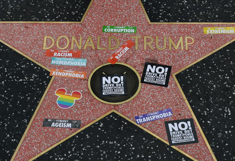 Donald Trump’s star has been vandalized many times. (Photo: Mark Ralston/AFP/Getty Images)