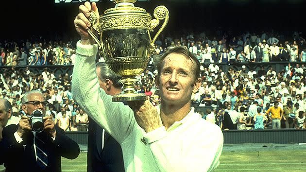 Rod Laver lifts the trophy after winning Wimbledon in 1969. Pic: Getty