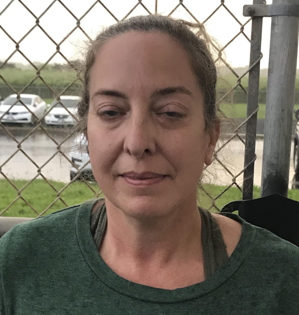 This photo provided by the Kauai Police Department shows Courtney Peterson in Lihue, Hawaii, on Nov. 29, 2020. Authorities say a couple was arrested at a Hawaii airport after traveling on a flight from the U.S. mainland despite knowing they were infected with COVID-19. The Kauai Police Department says Wesley Moribe and Courtney Peterson were arrested on suspicion of second-degree reckless endangering. (Kauai Police Department via AP)