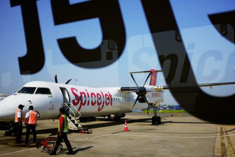 The Indian airline SpiceJet, pictured operating at the Indira Gandhi International Airport in New Delhi on October 5, 2015, is among carriers fined a total of $39 million November 17 for collusion on fuel surcharges