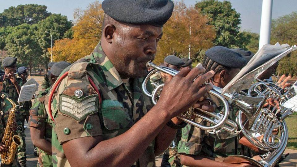 A soldier playing a trumpet in a military band to mark the official beginning of the electoral period ahead ahead of elections next year marching in Lilongwe, Malawi - Friday 2 August 2024