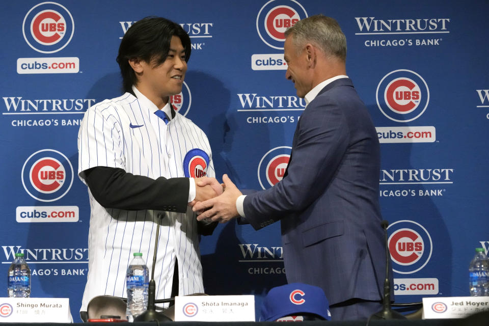 New Chicago Cubs pitcher Shōta Imanaga is shakes hands with Cubs president of baseball operations Jed Hoyer, right, during a news conference Friday, Jan. 12, 2024, in Chicago. The Japanese left-hander is expected to step right into the baseball team's rotation as it tries to return to the playoffs for the first time since 2020. (AP Photo/Nam Y. Huh)