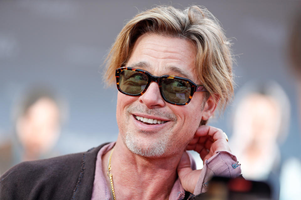 Brad Pitt posed in a skirt on the red carpet for 