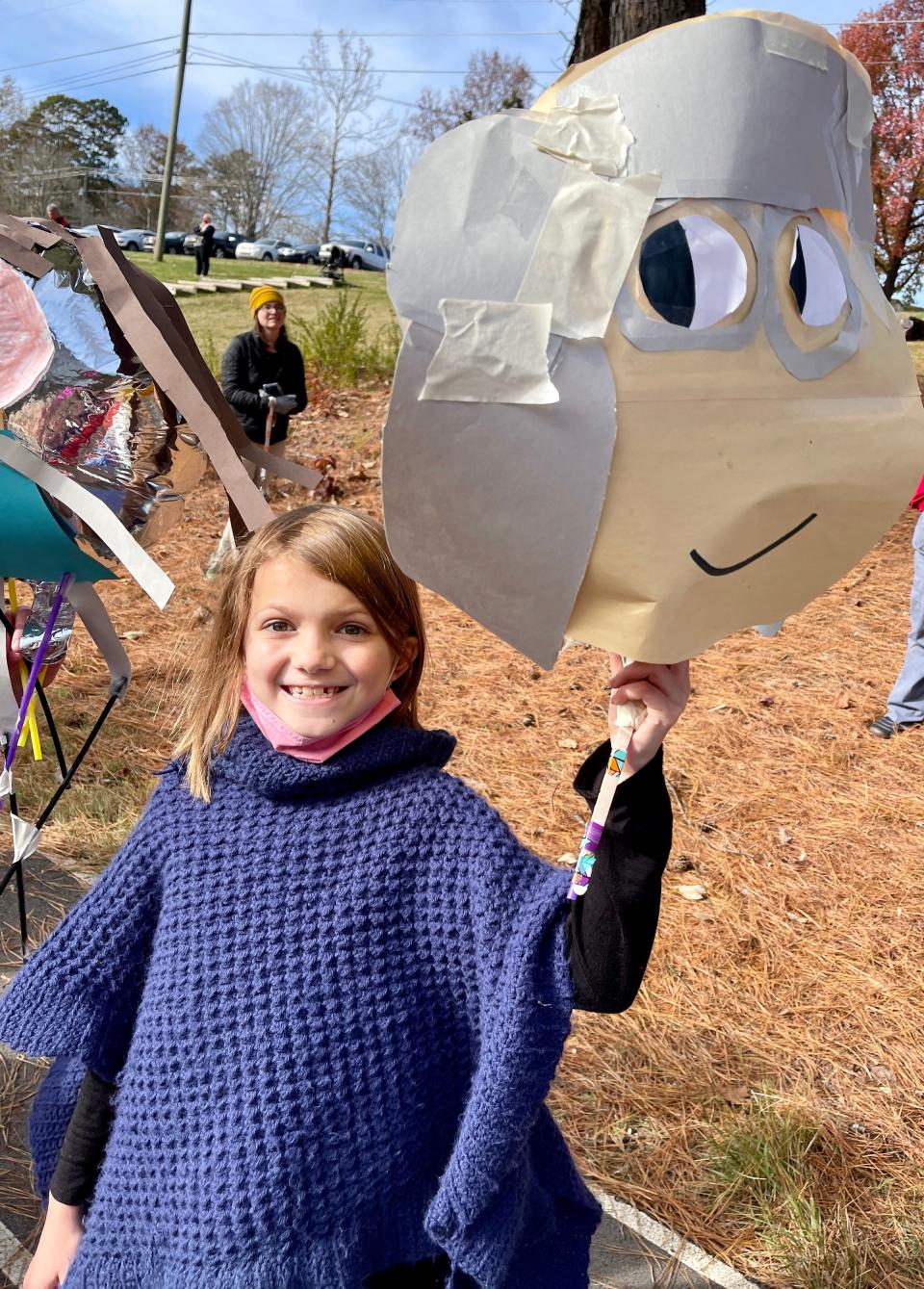 Susannah Chestnutt with her Benjamin Franklin gold balloon at Balloons over Shannondale at Shannondale Elementary on Nov. 23, 2021.