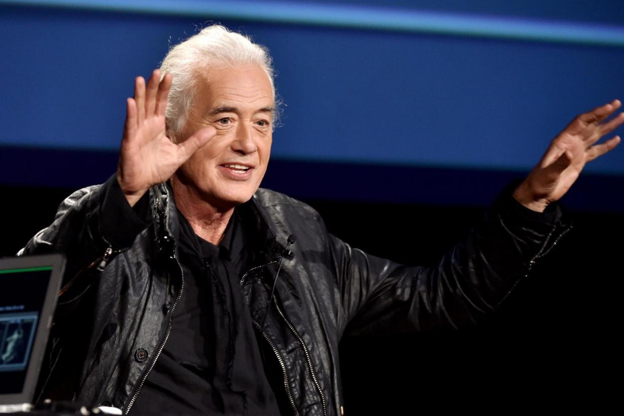 Jimmy Page: The former Led Zeppelin guitarist has won a deferral in the ongoing planning battle with his singer neighbour Robbie Williams (file photo): Getty Images