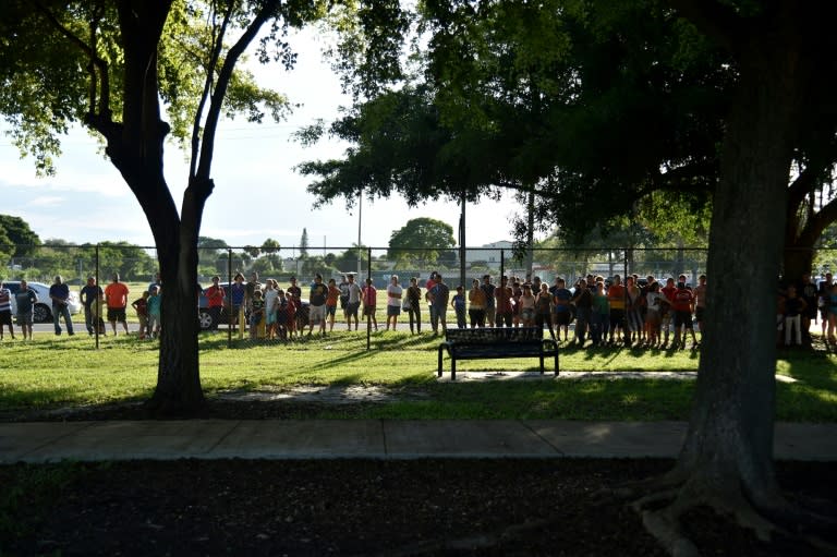 Fans watch a training session of Barcelona football team, at Barry University in Miami, Florida, on July 27, 2017, two days before their International Champions Cup friendly against Real Madrid