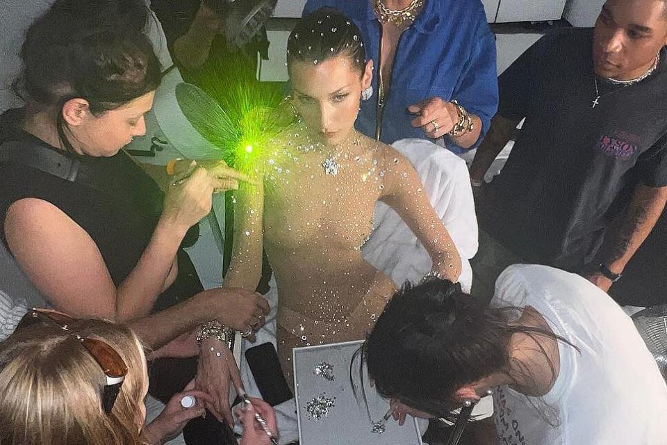 Bella Hadid Wears Crystal-Covered Nude Catsuit in Behind-the-Scenes Swarovski Pics