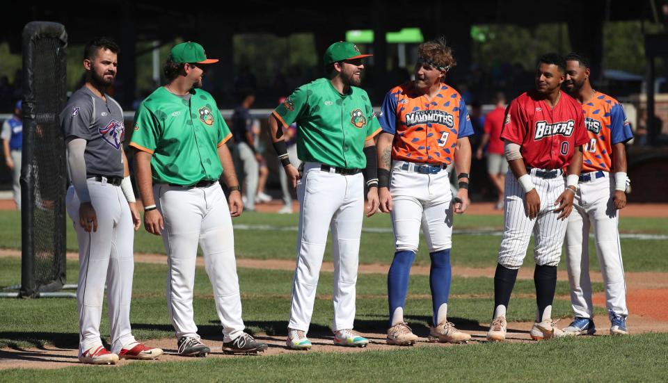 Utica Unicorns' Ari Sechopoulos, Eastside Diamond Hoppers' Nick Kreutzer and Joe Burke, Westside Woolly Mammoths' Buddy Dewaine Jr., Beavers' Dakota McFadden and Westside Woolly Mammoths' Greg Vaughn Jr. are introduced before the United Shore Professional Baseball League Home Run Derby at Jimmy John's Field in Utica, Saturday, July 9, 2022.