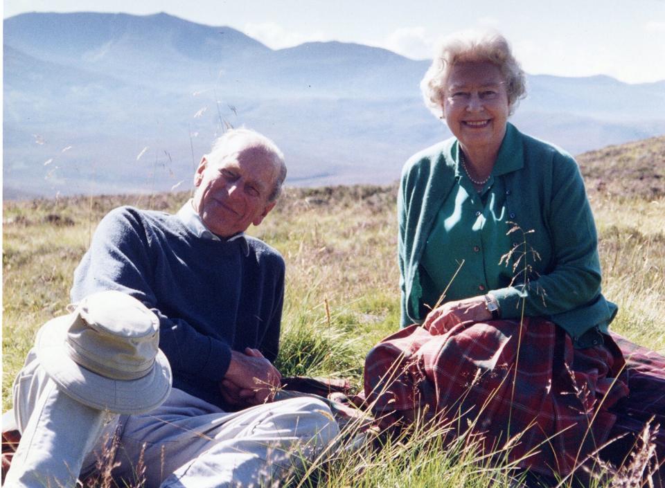 Queen Elizabeth II and Prince Philip, Duke of Edinburgh posing in a personal photograph at the top of the Coyles of Muick, taken by The Countess of Wessex in 2003