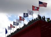 Sep 29, 2016; Chaska, MN, USA; A view of flags on the grand stands on the ninth green during a practice round for the 41st Ryder Cup at Hazeltine National Golf Club. Mandatory Credit: Michael Madrid-USA TODAY Sports