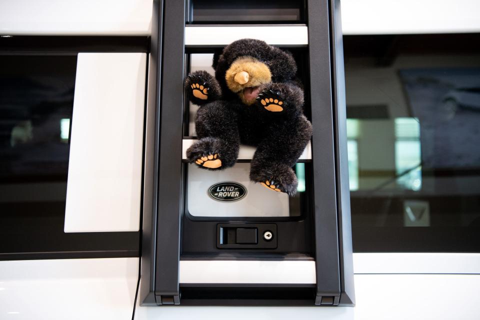 Plush black bears adorn the Land Rover Defender 130 SUV awarded to Appalachian Bear Rescue as part of Land Rover USA's Defender Service Awards during an event at Land Rover Knoxville on Tuesday, Feb. 21, 2023. 