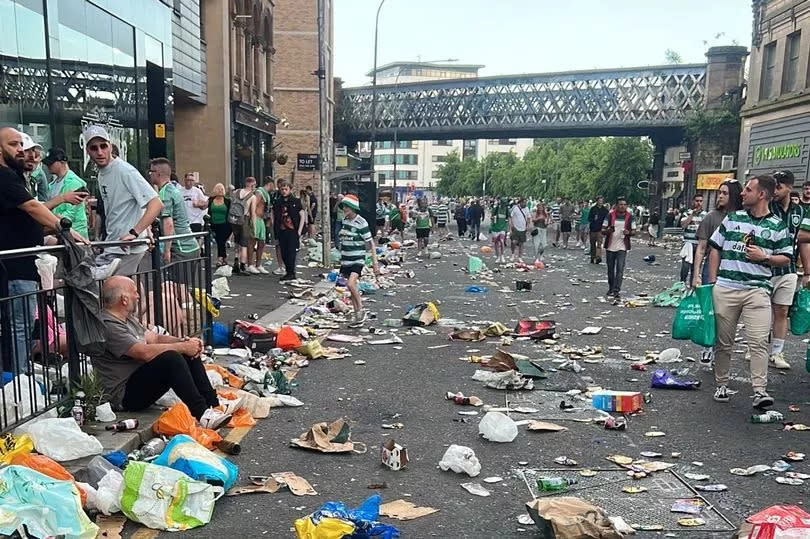 Litter strewn across High Street in Glasgow city centre.