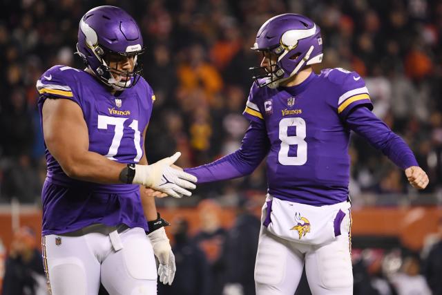 Minnesota Vikings offensive tackle Christian Darrisaw (71) blocks during  the first half of an NFL football game against the Chicago Bears, Sunday,  Jan. 8, 2023, in Chicago. (AP Photo/Kamil Krzaczynski Stock Photo - Alamy