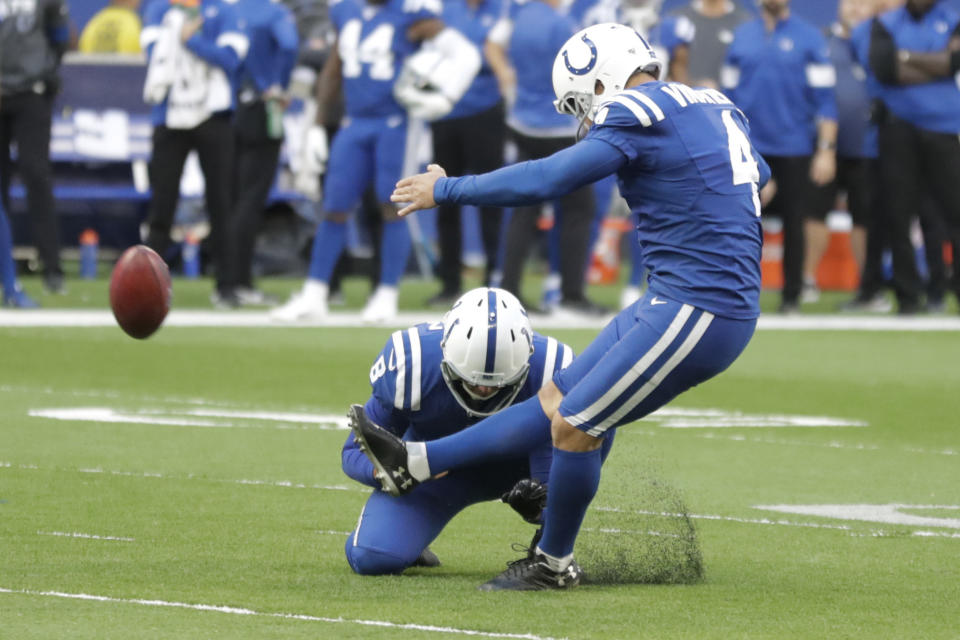 FILE - In this Oct. 27, 2019, file photo, Indianapolis Colts kicker Adam Vinatieri (4) kicks the game winning field goal out of the hold of Rigoberto Sanchez (8) during the second half of an NFL football game against the Denver Broncos in Indianapolis. The Colts now have two kickers under contract for next season while the NFL's career scoring leader, Adam Vinatieri, remains a free agent. On Wednesday, April 29, 2020, team officials announced they had signed 10 undrafted rookies including Rodrigo Blankenship of Georgia, one of last season's top college kickers. (AP Photo/Michael Conroy, File)