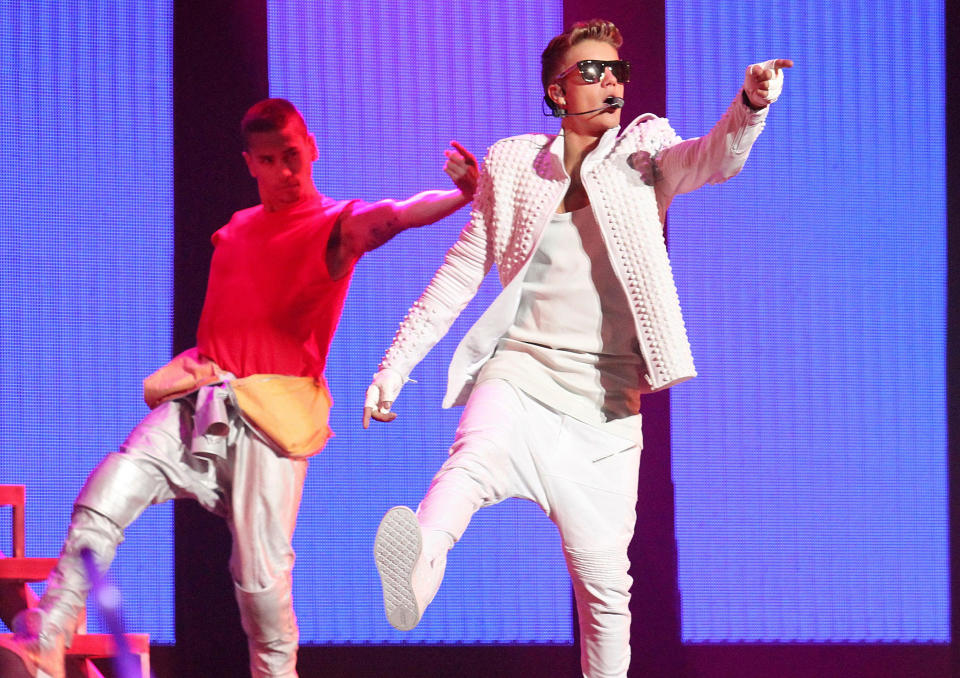 FILE PHOTO – Canadian pop singer Justin Bieber (R) performs during his world tour concert in Beijing, China September 29, 2013. REUTERS/Stringer/File Photo ATTENTION EDITORS – THIS IMAGE WAS PROVIDED BY A THIRD PARTY. CHINA OUT. NO COMMERCIAL OR EDITORIAL SALES IN CHINA. – RTX3CCGW - Credit: REUTERS