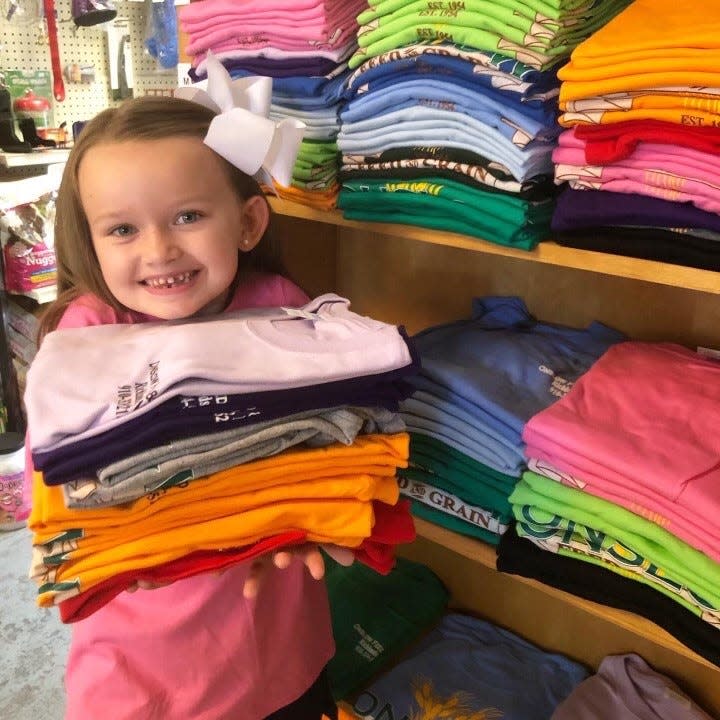 Scott and Stacy Pitts' 7-year-old daughter Sloane loves to work at the shop and wants to work there when she gets older.