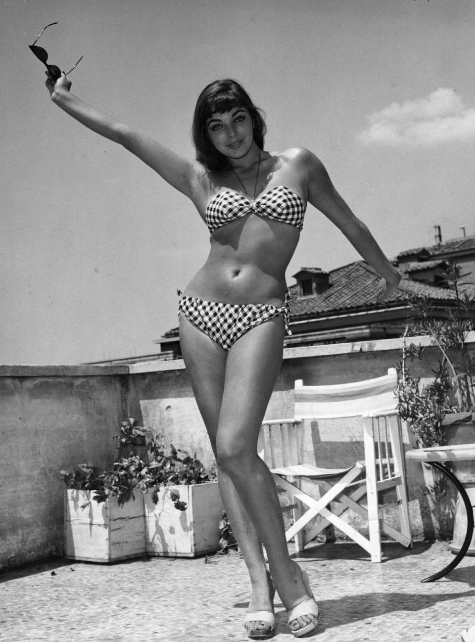 Joan Collins pictured in 1958 at the age of twenty, whilst filming in Rome for In the Land of the Pharaohs (Getty Images)