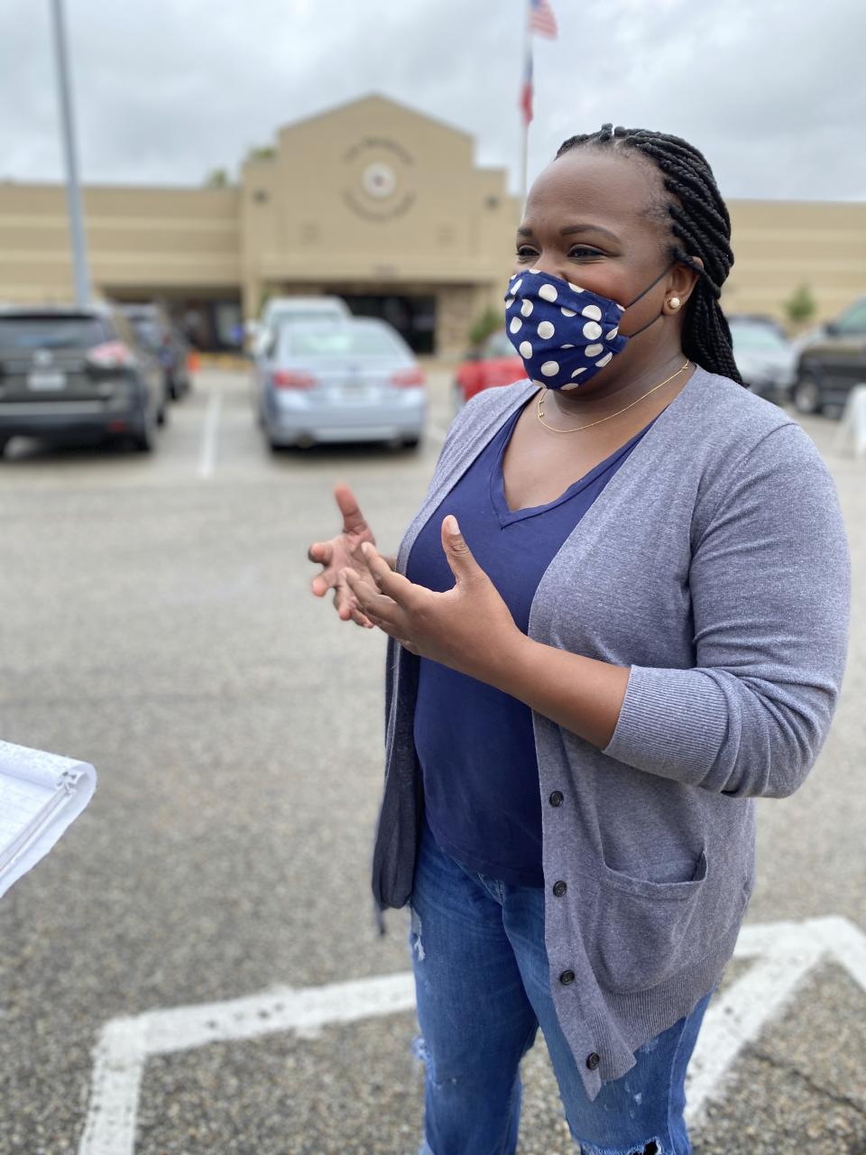 Akilah Bacy, a Houston lawyer and candidate for Texas state house district 138, speaks with the Associated Press outside of a voting center in the Spring Branch neighborhood, Friday Oct. 16, 2020 in Houston. Bacy, a Democrat, is vying for an open seat in what could be a closely contested district. Texas Democrats hope to regain control of the state house after decades out of power. (AP Photo/John L. Mone)